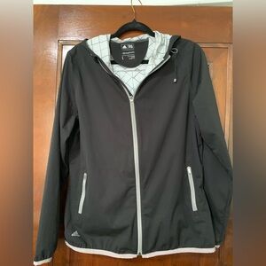 Adidas women's Black golf Windbreaker with White Details